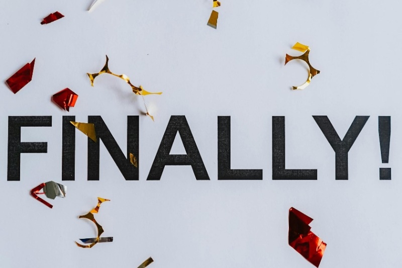 the word FINALLY! with some confetti